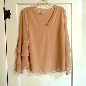 Calvin Klein peach flowy blouse with three tier trumpet sleeves. L